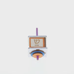 Spinning colored dreidel