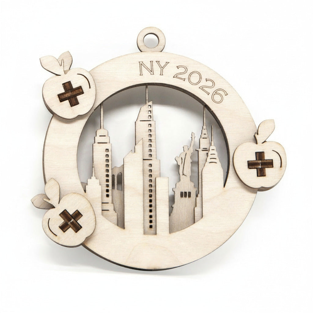Decorative ornament with 'NY 2026' and cityscape design on a white background