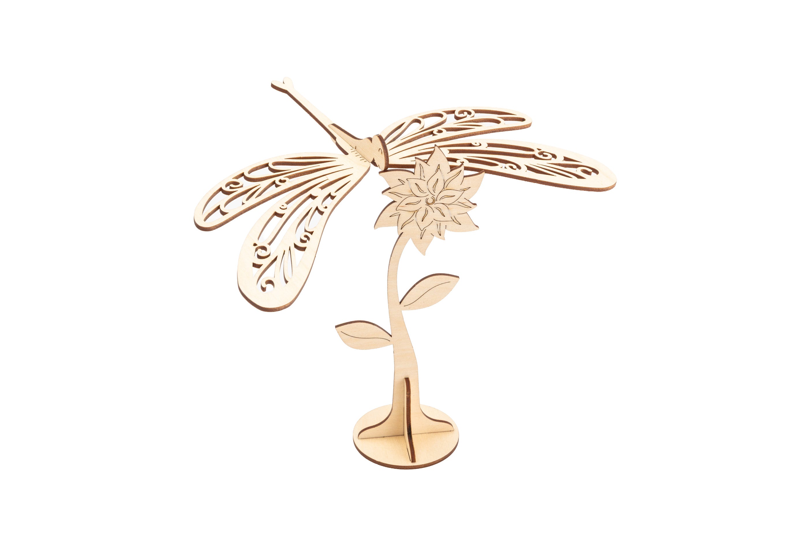 Laser cut wooden dragonfly and flower on a white background