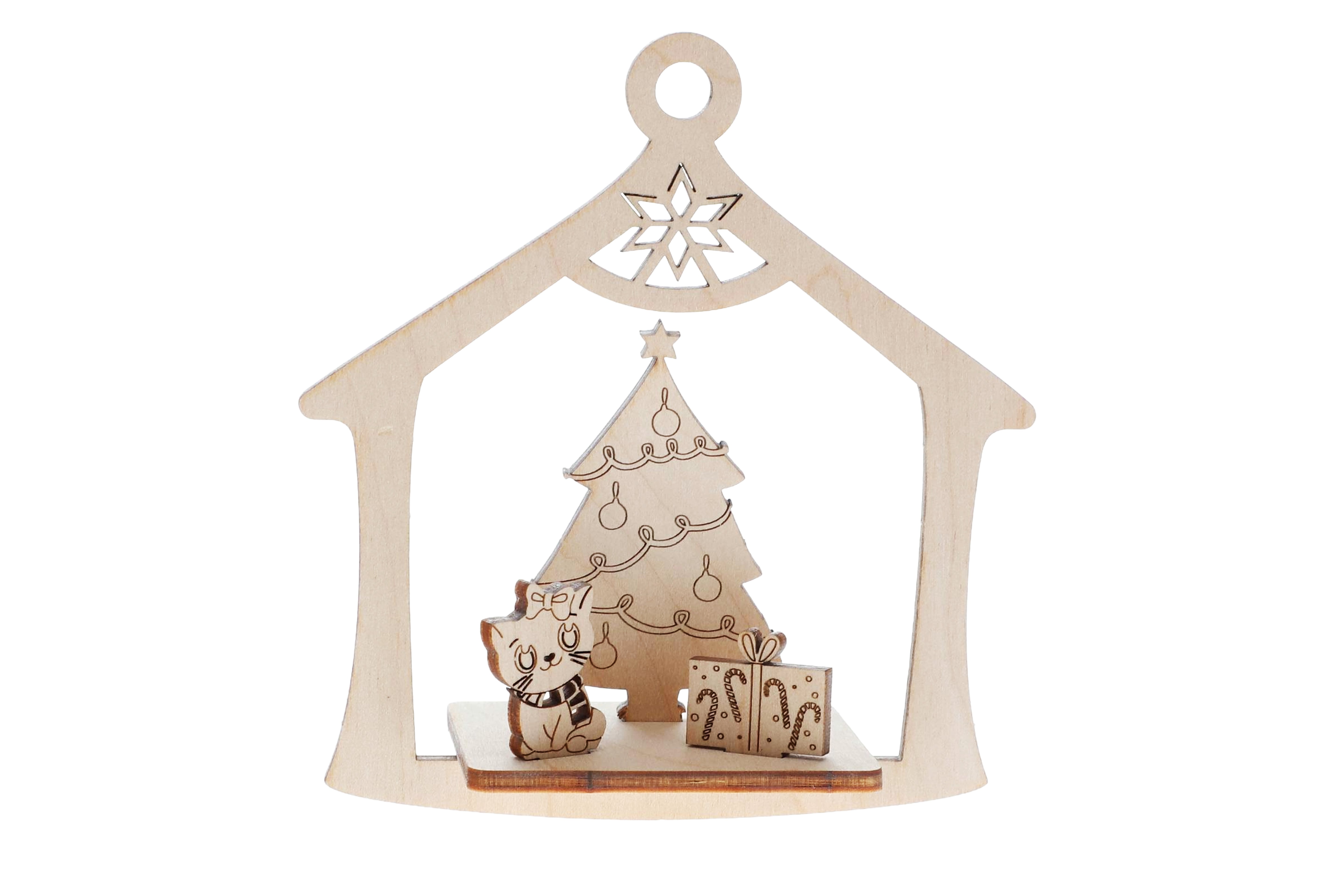 Wooden laser cut Christmas ornament with a tree, house, and cat on a white background