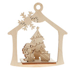 Wooden laser cut ornament with a dog, tree and presents on a white background