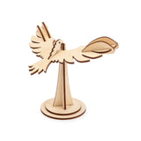 Wooden balancing eagle on a white background