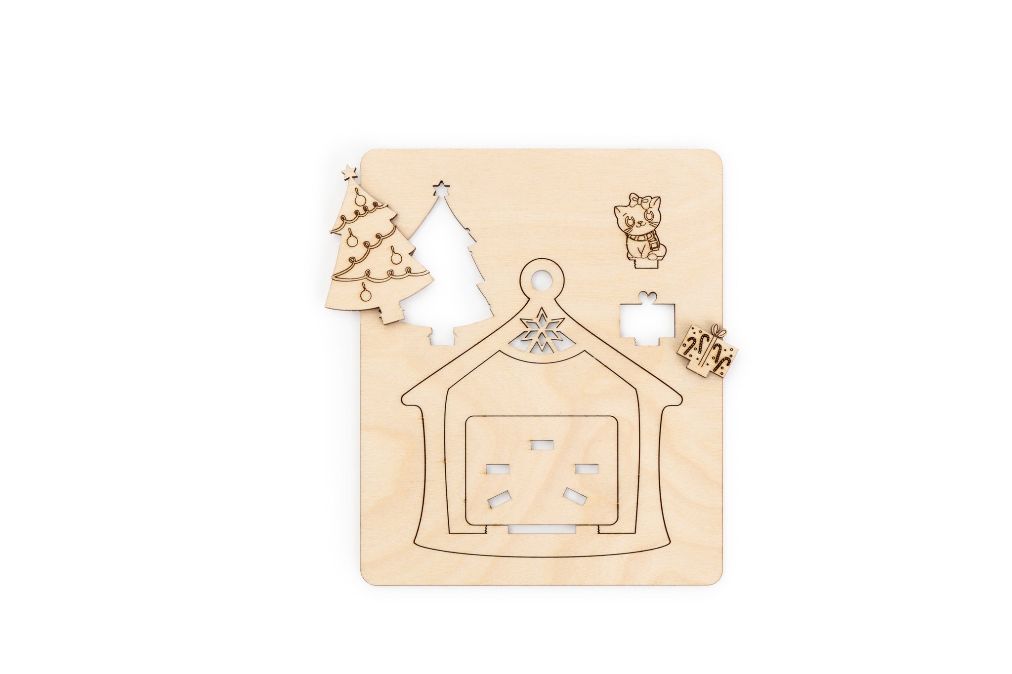 Laser cut tree, cat and present ornament on a square wooden board - punchouts showing
