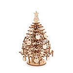 Wooden Christmas tree model with small laser cut ornaments hanging on ends
