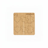 CubeMaster Rookie 3D wooden puzzle showing wooden board with all the pieces