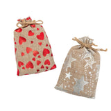Two rustic hemp drawstring pouches for binary magic cards: one decorated with shiny red hearts and the other with a celestial star pattern, shown side-by-side