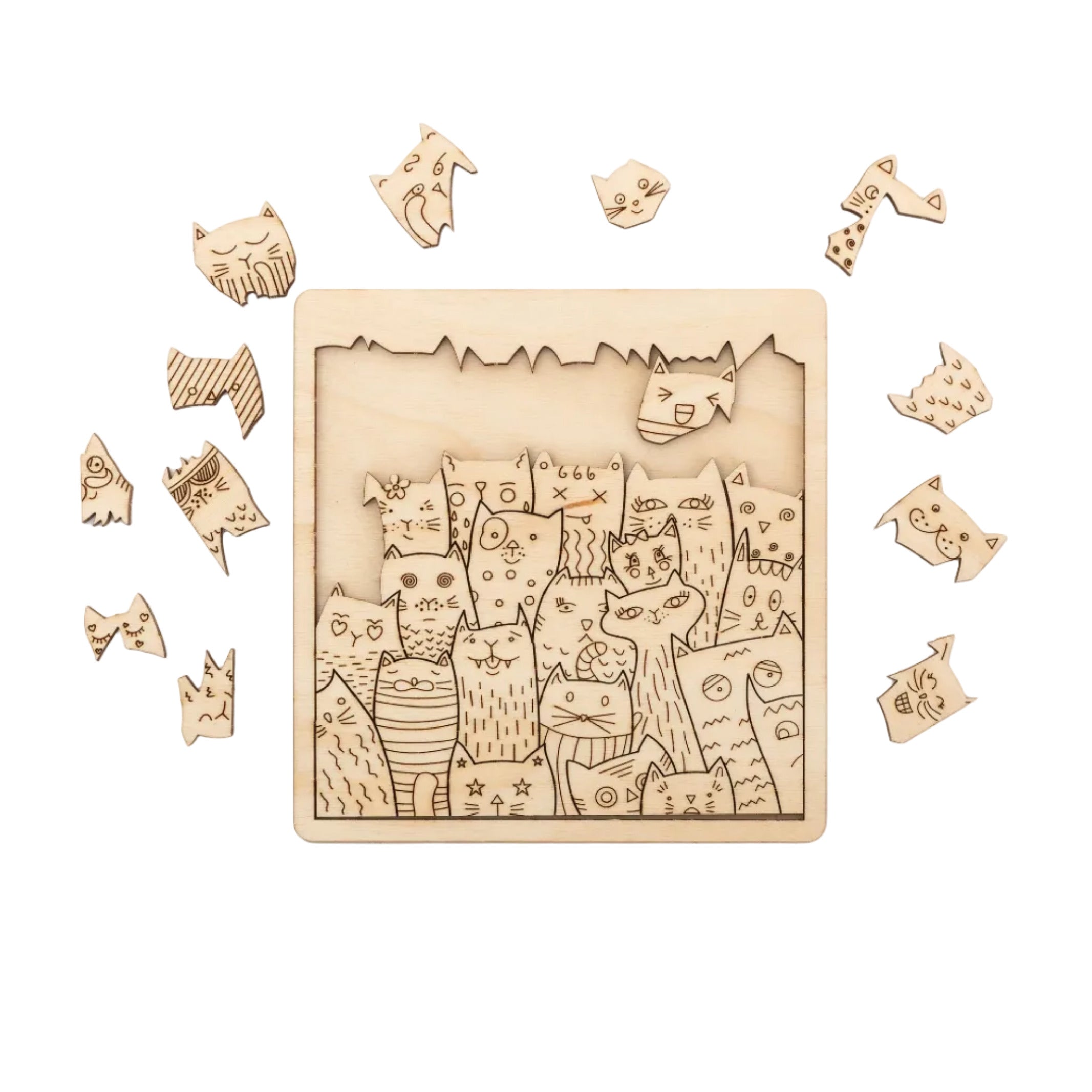 "For the Purrfect Fit" cat jigsaw puzzle partially  surrounded by a scattering of loose, puzzle pieces around the edges.