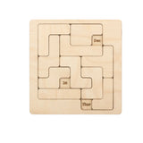 A solved 365-in-one daily calendar challenge showing the birch wood pieces arranged to reveal a specific date on the board."